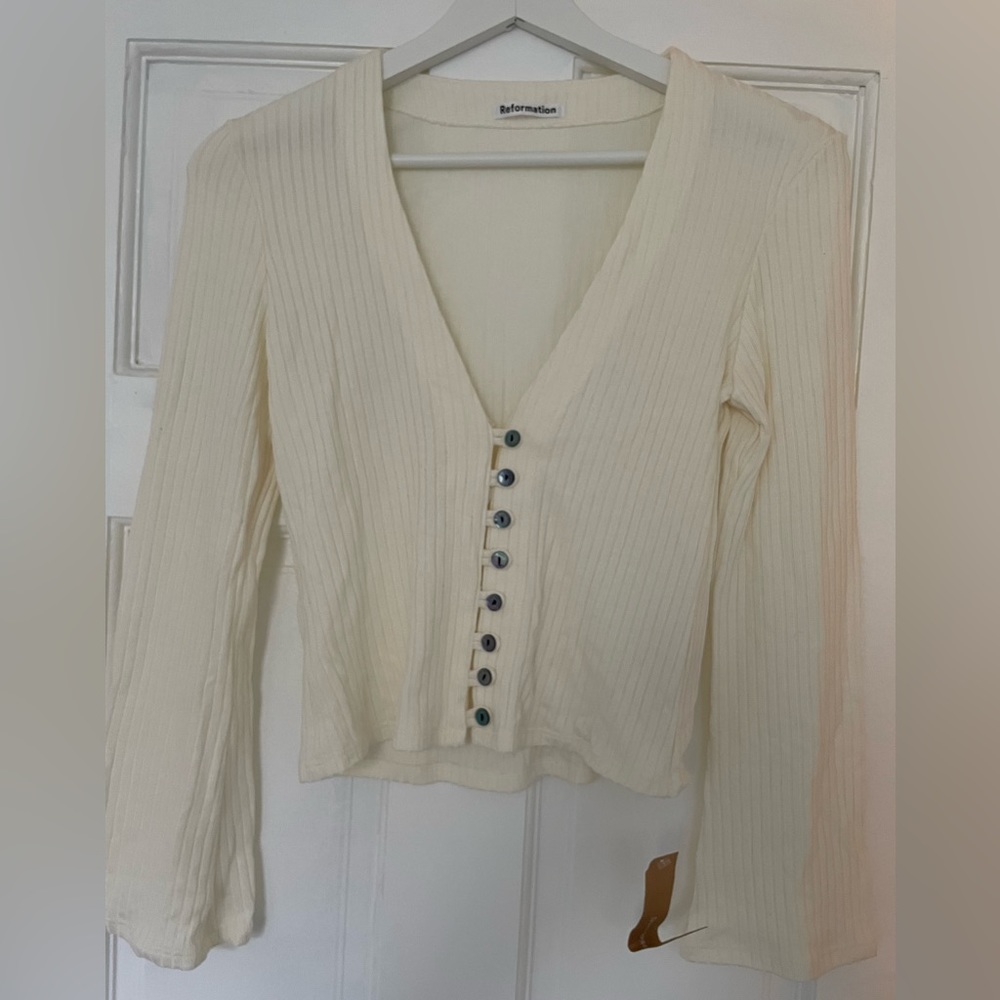 Beautiful ivory reformation top with iridescent buttons
